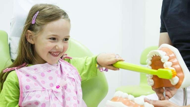 A girl patient in Northborough MA preparing for a dental sealants