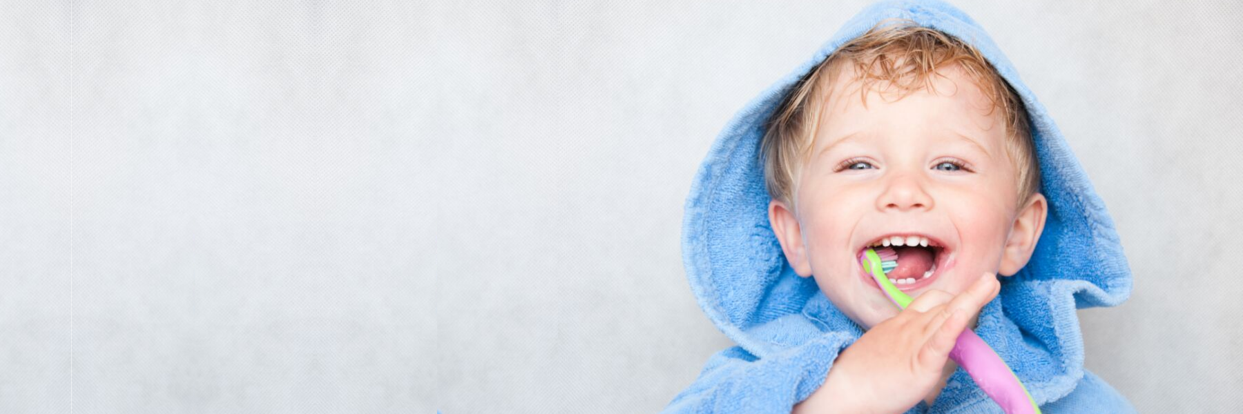 Toddler brushing his teeth at pediatric dentist in Northborough